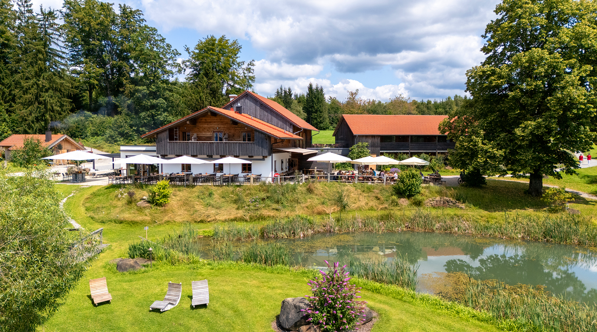 GutsAlm Harlachberg - Die besondere Eventlocation in Bodenmais in Bayern GutsAlm Harlachberg - Eventhotel und Chalets für Hochzeiten, Firmenfeiern und Seminare in Bodenmais